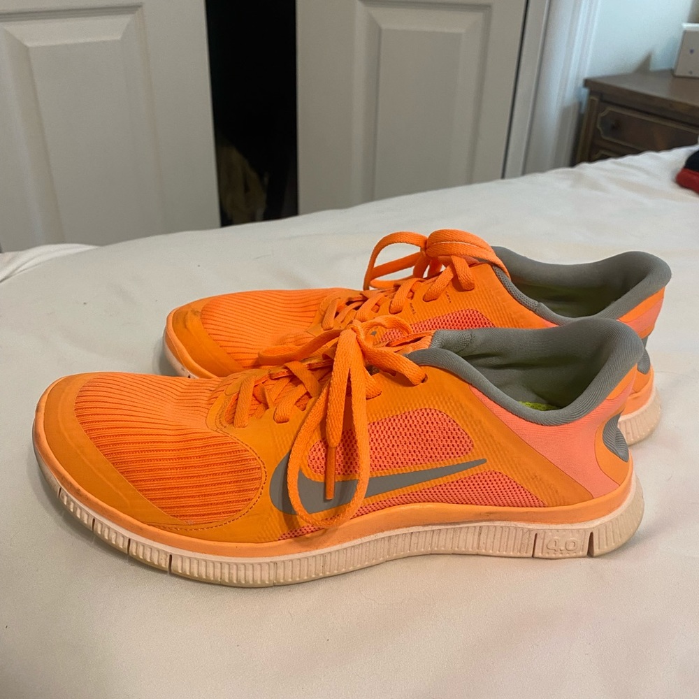 Nike orange free run sneakers